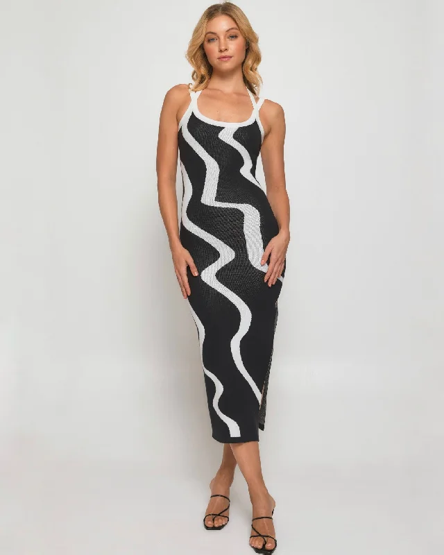 Midi dresses with asymmetric hems for a fashion - forward and dynamic appearance HEIDI MIDI DRESS-ABSTRACT PRINT Midi dresses with asymmetric hems for a fashion - forward and dynamic appearance HEIDI MIDI DRESS-ABSTRACT PRINT