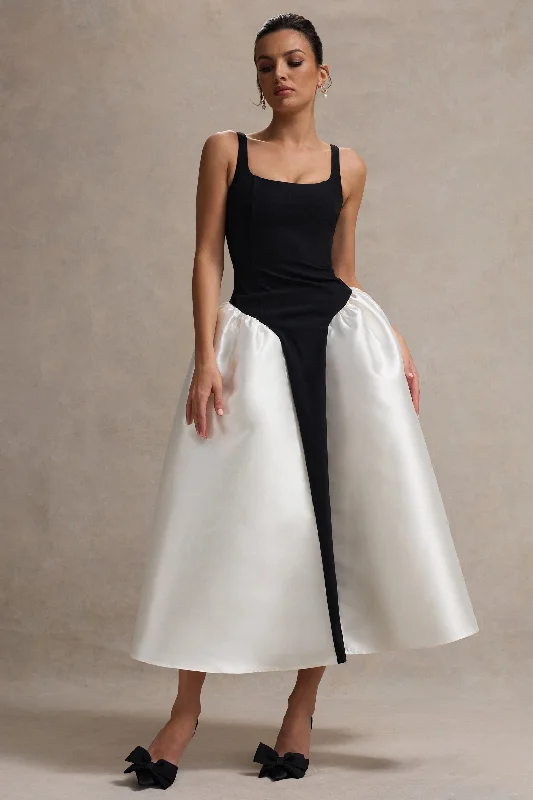 Velvet midi dresses in jewel tones for a glamorous winter event Christie | Black and Cream Scoop-Neck Midi Dress With Volume Skirt Velvet midi dresses in jewel tones for a glamorous winter event Christie | Black and Cream Scoop-Neck Midi Dress With Volume Skirt