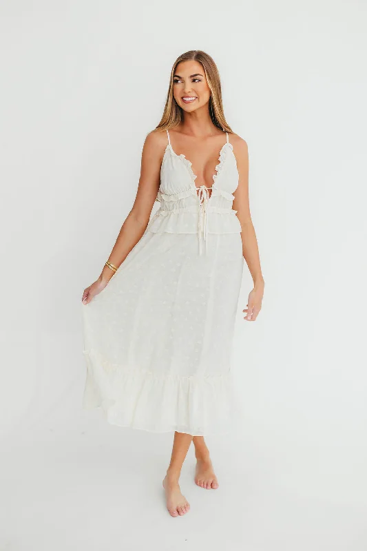 Midi dresses with geometric cutouts for a contemporary and edgy look Jordan Midi Dress in Cream Floral Midi dresses with geometric cutouts for a contemporary and edgy look Jordan Midi Dress in Cream Floral