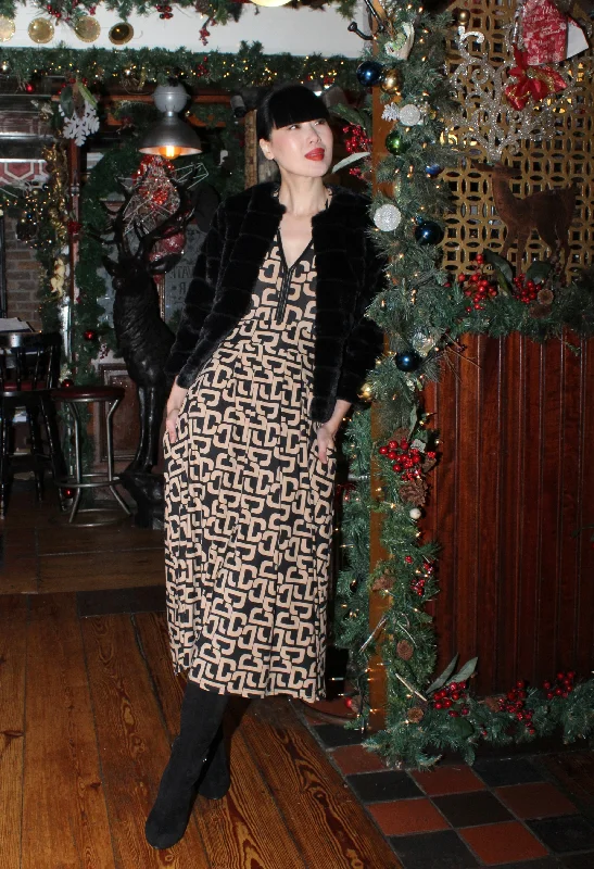 Midi dresses with keyhole backs for a flirty and unexpected detail Monogram V Neckline Dress Midi dresses with keyhole backs for a flirty and unexpected detail Monogram V Neckline Dress
