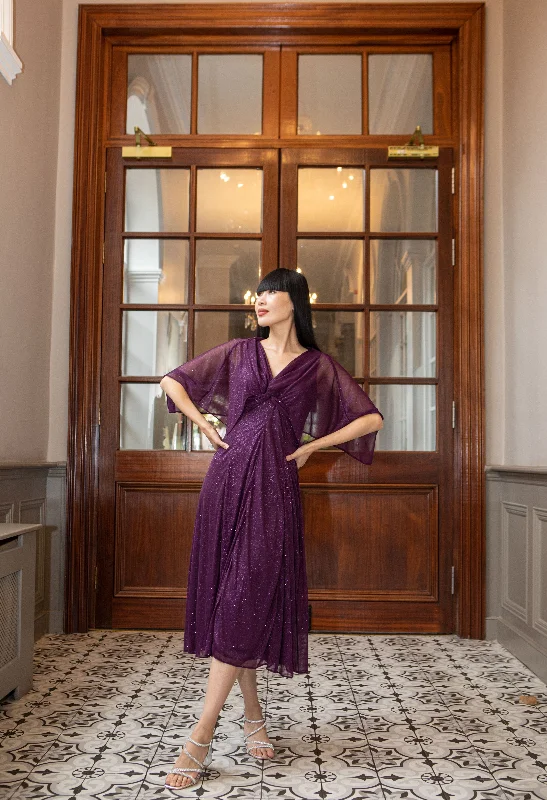 Maxi - inspired midi dresses with flowing fabrics for a beachy vibe Knot Detail Sparkle Dress Maxi - inspired midi dresses with flowing fabrics for a beachy vibe Knot Detail Sparkle Dress