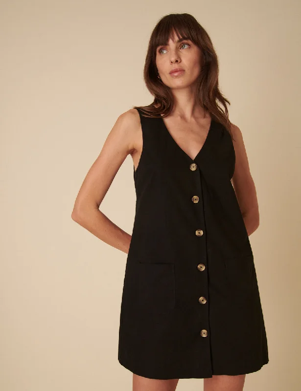 Mini dresses with V - necklines for a flattering shape Black Linen-blend Claudette Pinafore Mini Dress Mini dresses with V - necklines for a flattering shape Black Linen-blend Claudette Pinafore Mini Dress