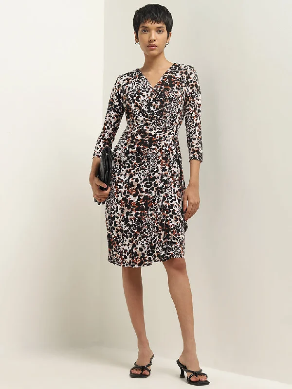 Little Black Women Dress with Sequins for a Glamorous Night Out Little Black Women Dress with Sequins for a Glamorous Night Out Wardrobe Black Animal Print Wrap-Style Dress Little Black Women Dress with Sequins for a Glamorous Night Out Little Black Women Dress with Sequins for a Glamorous Night Out Wardrobe Black Animal Print Wrap-Style Dress
