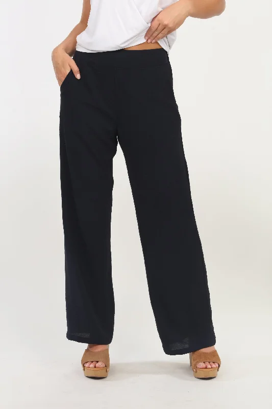 Women's pants for garden parties Colored women jeans in vibrant hues like red and yellow Woven Pant Women's pants for garden parties Colored women jeans in vibrant hues like red and yellow Woven Pant