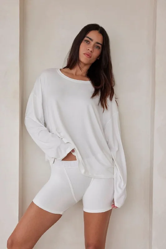 Ruffled Bodysuits with a Playful and Feminine Touch The Cloud Long Sleeve Tee